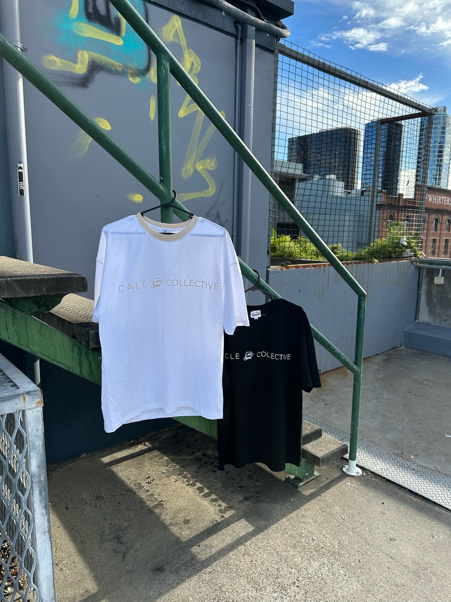 White oversized graphic t shirt by Cale Collective